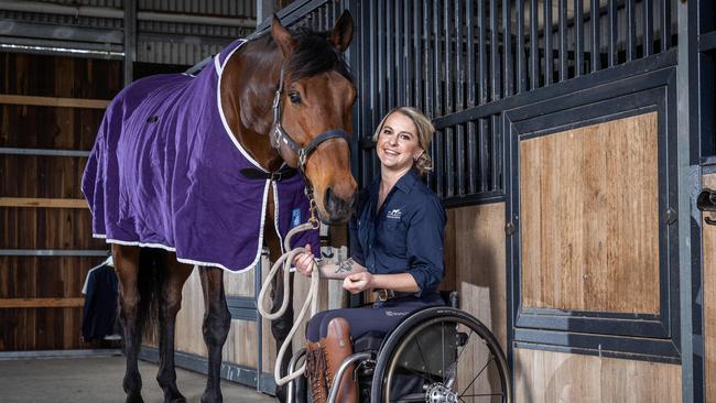 Australian Paralympic equestrian and VRC ambassador Emma Booth and her horse Big Ben at her Langwarrin South stables. Picture: Jake Nowakowski