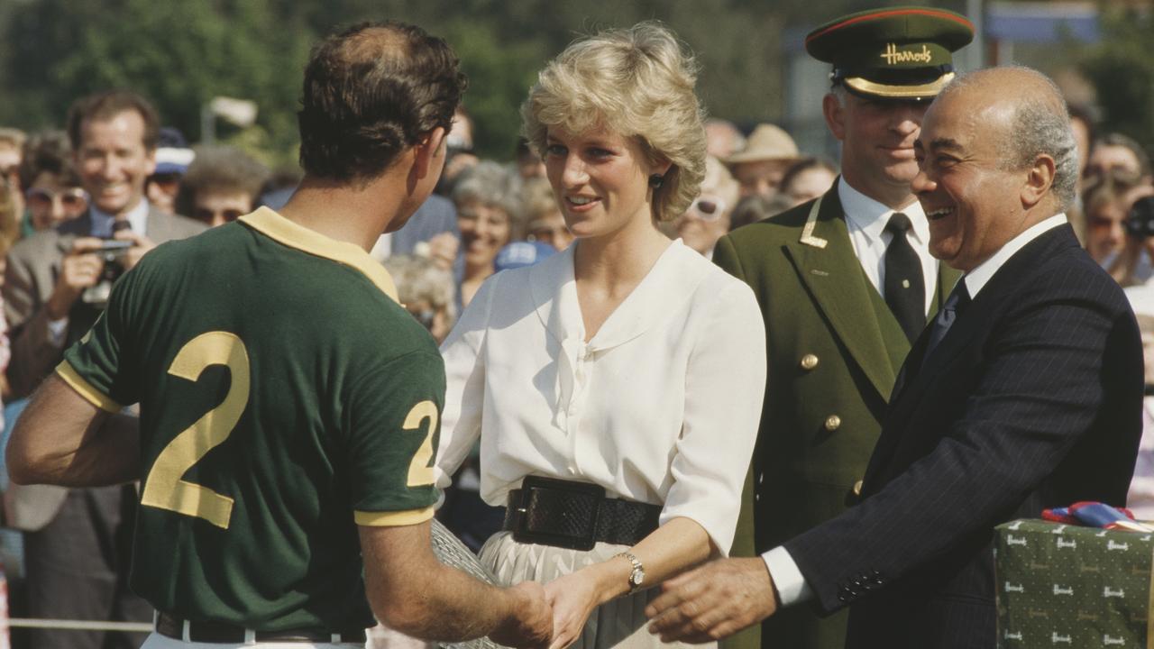 Diana, Princess of Wales (1961 – 1997) with Prince Charles during the Harrods Polo Cup at Smith's Lawn in Windsor, UK in 1987 presenting the prizes along with then Harrods owner Mohamed Al-Fayed (right). (Photo by Jayne Fincher/Princess Diana Archive/Getty Images)