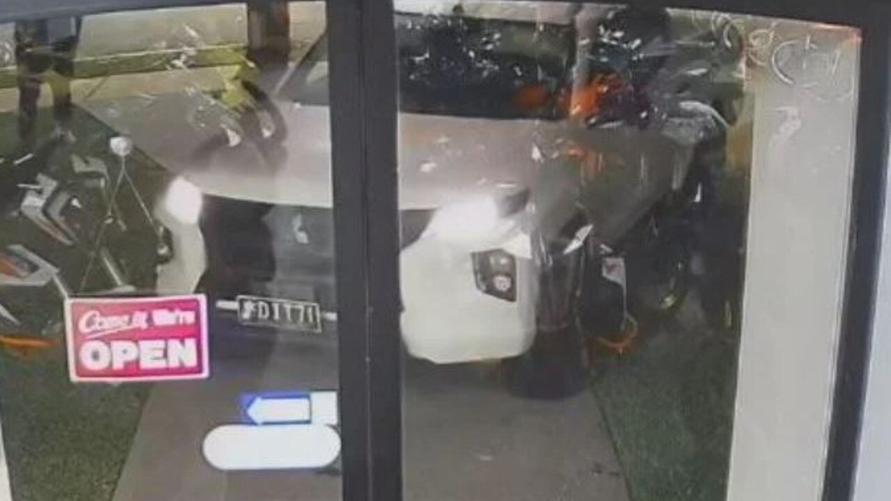 CCTV footage of the 2022 Mitsubishi Triton dual cab, stolen from Gracemere on Sunday, June 11, ramming the doors of Gladstone Motorcycles.