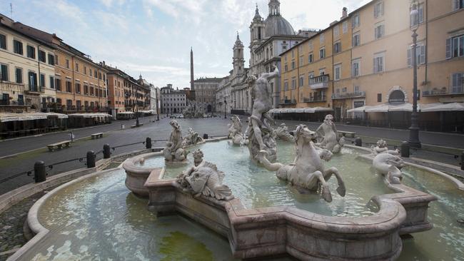 The empty Piazza Navona in Rome overnight. Picture: AP