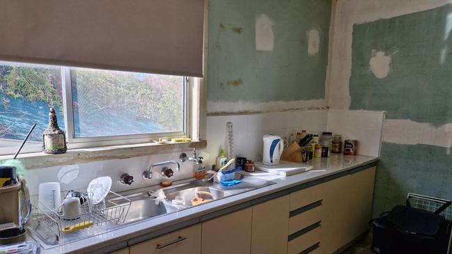 The Murraville home’s kitchen has seen better days.