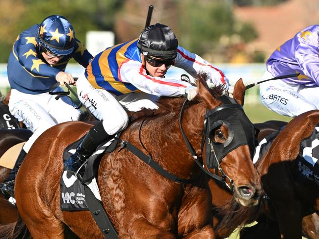 MELBOURNE, AUSTRALIA - MAY 31: Tom Prebble riding Jimmy The Bear (L) defeating Regal Zeus in Race 6, the Jra Handicap  during Melbourne Racing at Caulfield Racecourse on May 31, 2025 in Melbourne, Australia. (Photo by Vince Caligiuri/Getty Images)