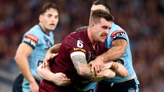 BRISBANE, AUSTRALIA - JUNE 27: Cameron Munster of the Maroons charges forward during game two of the 2021 State of Origin series between the Queensland Maroons and the New South Wales Blues at Suncorp Stadium on June 27, 2021 in Brisbane, Australia. (Photo by Chris Hyde/Getty Images)