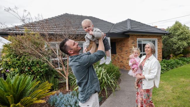 Justin and Alex Shimmin, with their children Fenna, aged 3, and Ari,15 months have put their Oak Park investment property is up for sale - which is among the 1000s of homes expected to sell this spring. Picture: Ian Currie