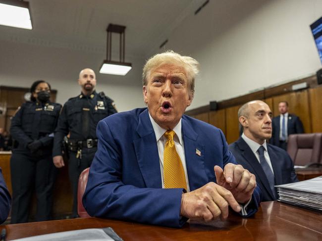 Former US president Donald Trump attends his trial for allegedly covering up hush money payments linked to extramarital affairs, at Manhattan Criminal Court in New York City. Picture: AFP