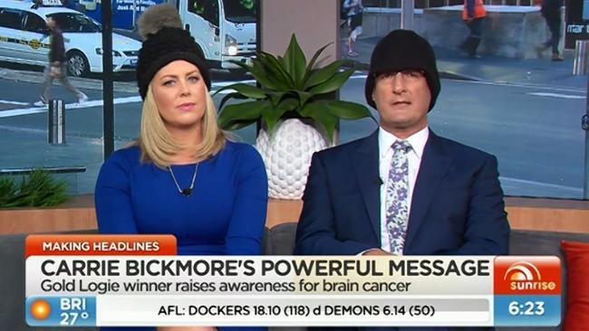 Kochie and Sam don the beanie for Carrie and brain cancer