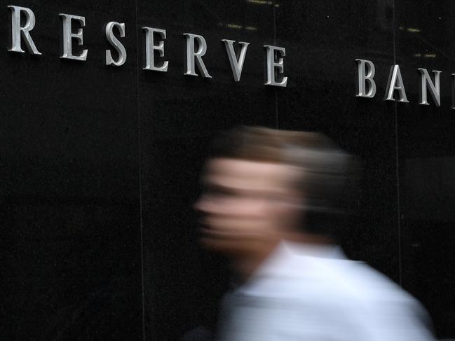 A pedestrian walks past the Reserve Bank of Australia (RBA) building in Sydney, Tuesday, March 3, 2020. The Reserve Bank is expected to cut the cash rate to a new record low 0.5 per cent on Tuesday. (AAP Image/Joel Carrett) NO ARCHIVING