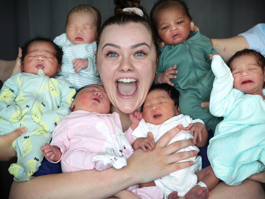 The west is celebrating a baby boom. Joan Kirner Women's and Children's Hospital midwife Olivia Kivlighon with some of the new bubs welcomed in August. Picture: David Caird