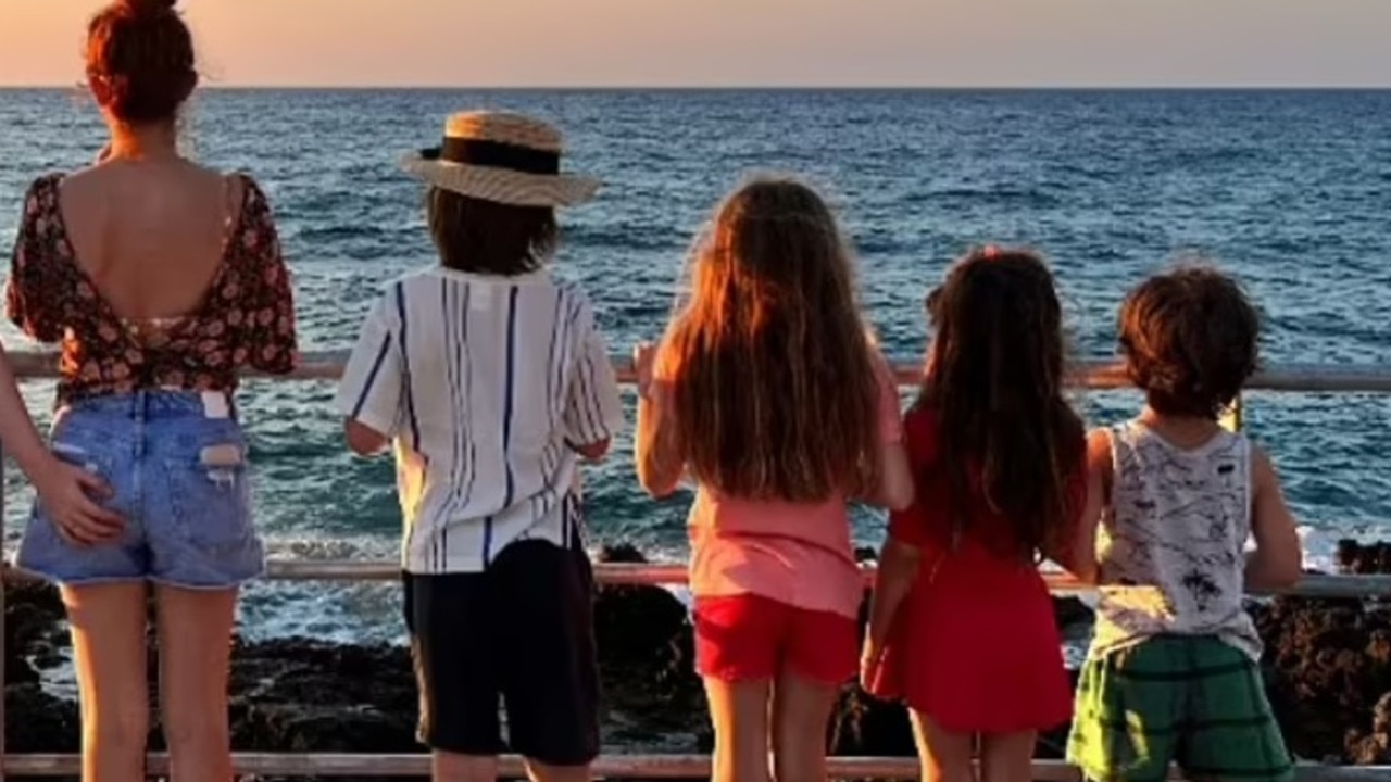 Isla Fisher posted a cryptic picture to social media with a mystery person cropped out. Picture: Instagram.