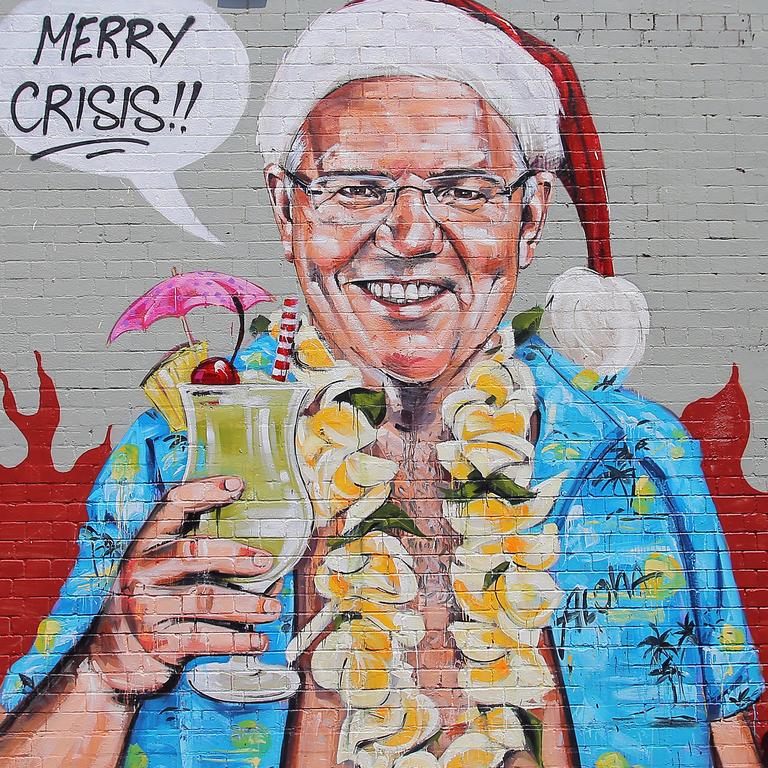 A mural depicting Scott Morrison wearing an unbuttoned Hawaiian shirt, orange lei and Santa Claus hat while holding a cocktail by artist Scott Marsh. Picture: Steven Saphore/AAP