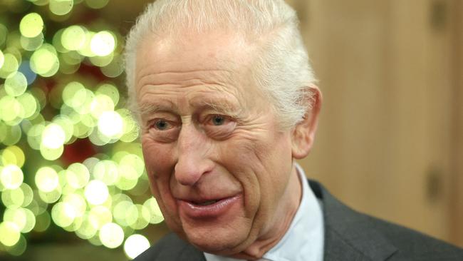 Britain's King Charles III smiles during The King's Foundation's annual 'Crafts at Christmas' at Highgrove Gardens on December 13, 2024 in Tetbury, western England. The King's Foundation is a charitable organisation established by His Majesty when he was Prince of Wales, in 1990. The foundation's mission is to foster and strengthen communities where people, places, and the planet can thrive together in harmony. King Charles III continues to serve as the foundation's Royal Founding President. (Photo by Chris Jackson / POOL / AFP)