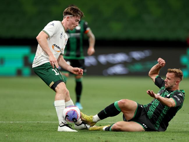 Newcastle’s Clayton Taylor (left) and Western United’s Michael Ruhs are set to do battle in an Australia Cup playoff in Darwin in July. Picture: Jonathan DiMaggio/Getty Images