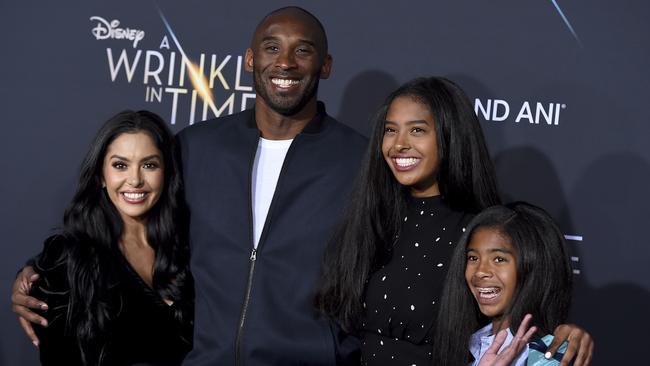 Kobe Bryan with his wife Vanessa and daughters Natalia and Gianna.