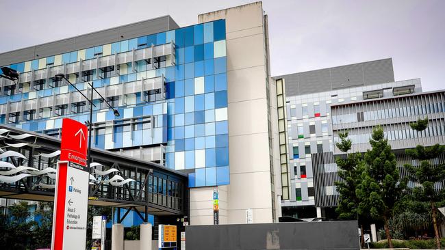 Staff at Gold Coast University Hospital are doing extraordinary work amid record demand. Picture: Patrick Hamilton / AFP.