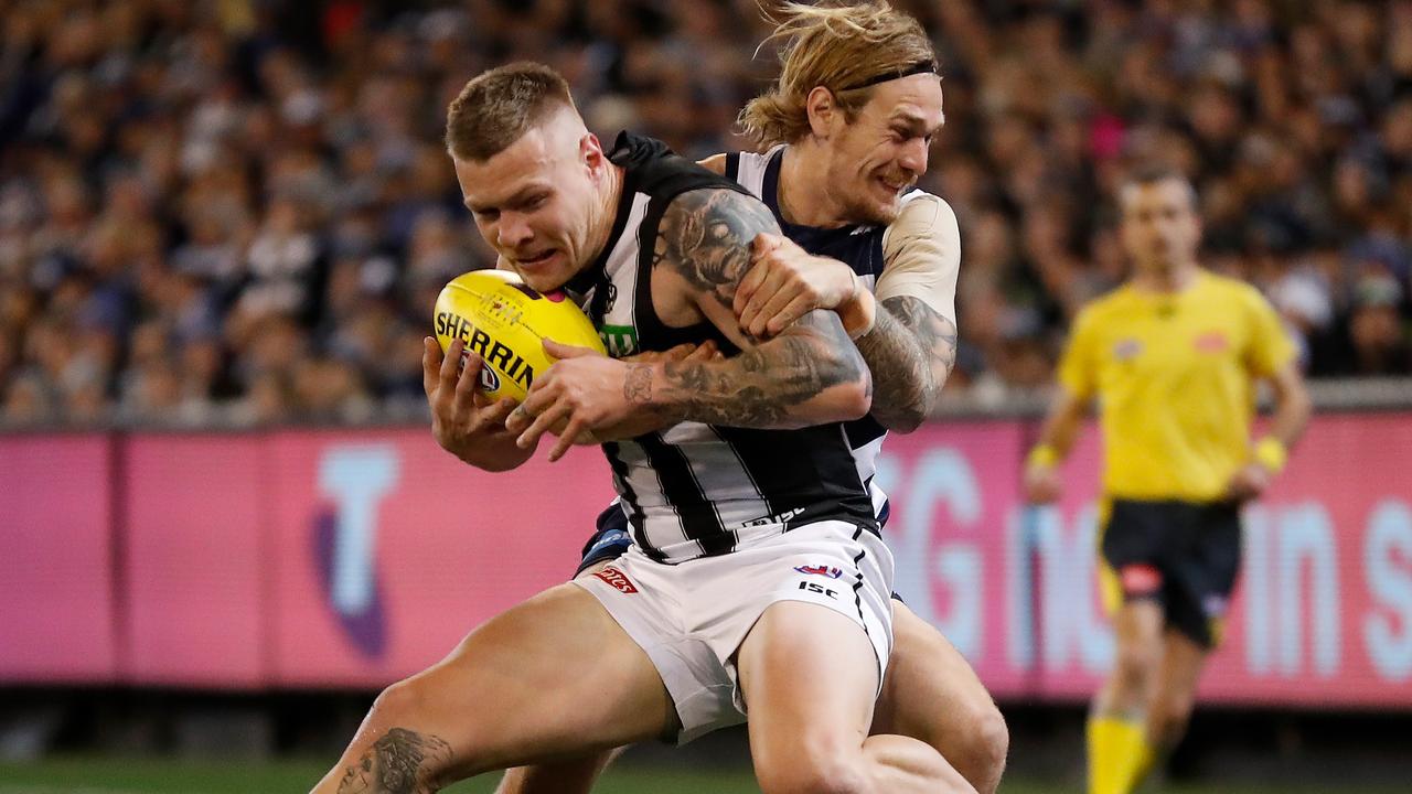 Jordan De Goey is tackled by Tom Stewart early in Friday night’s qualifying final.