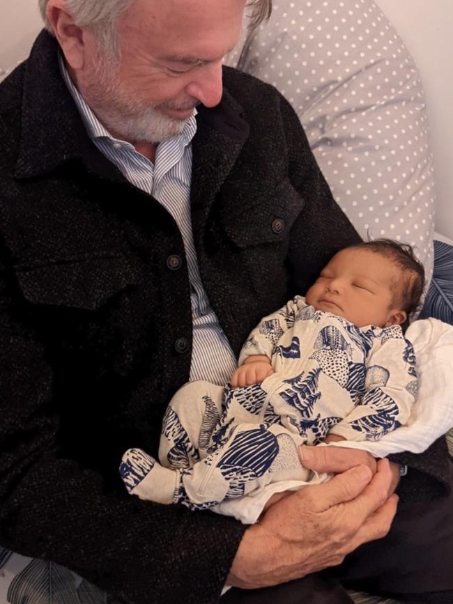 Sam Neill with new grandson Nahlo. Picture: Instagram