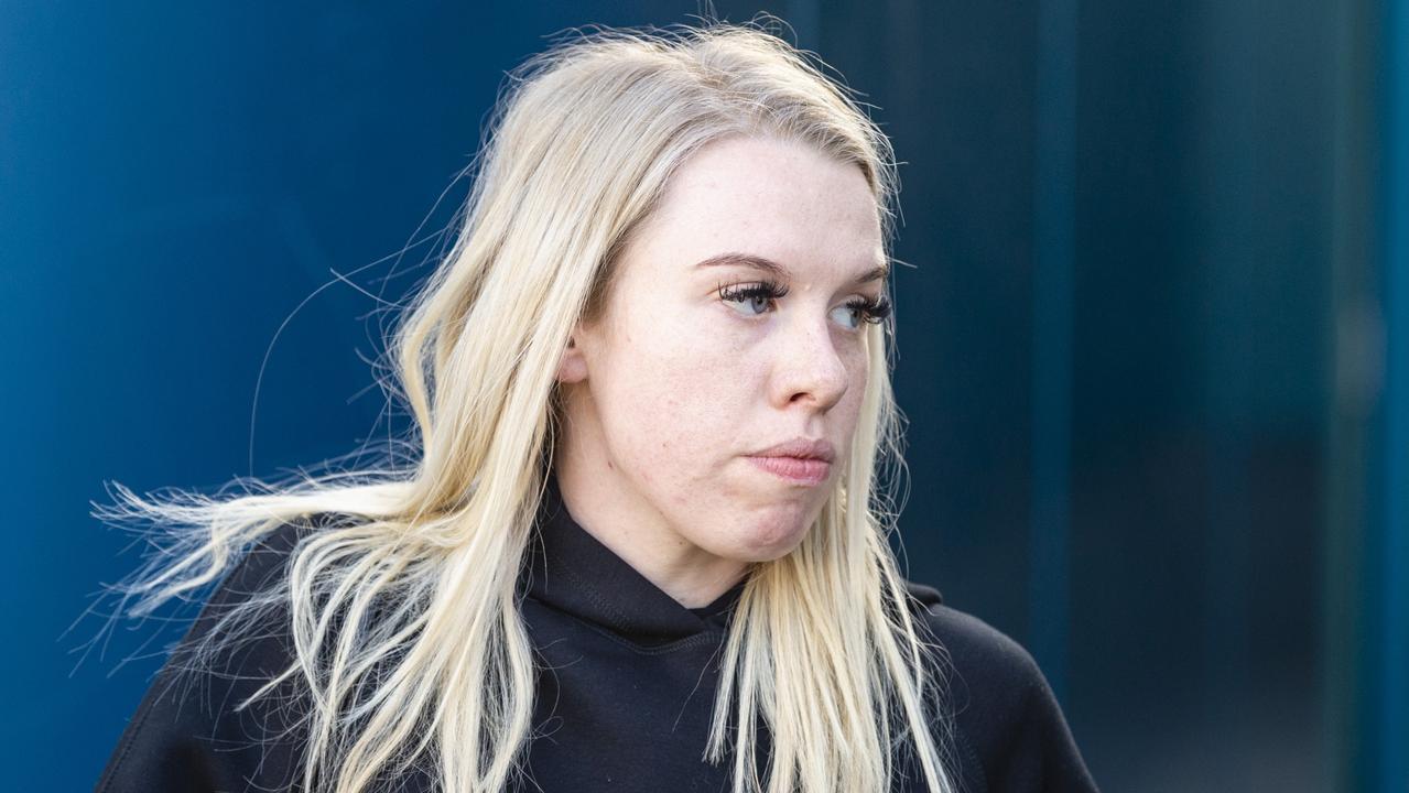 Isobel Rose Higgins, 24, leaves the Toowoomba Watch House after being charged with being an accessory after the fact of murder of Thor Morgan, Thursday, August 18, 2022.