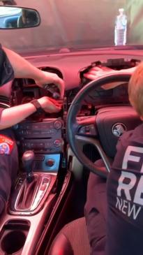 Firefighters rescue kitten stuck behind car dashboard