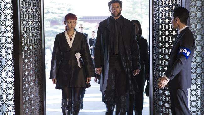 Rila Fukushima, left, and Hugh Jackman in a scene from "The Wolverine." (AP Photo/20th Century Fox, Ben Rothstein)