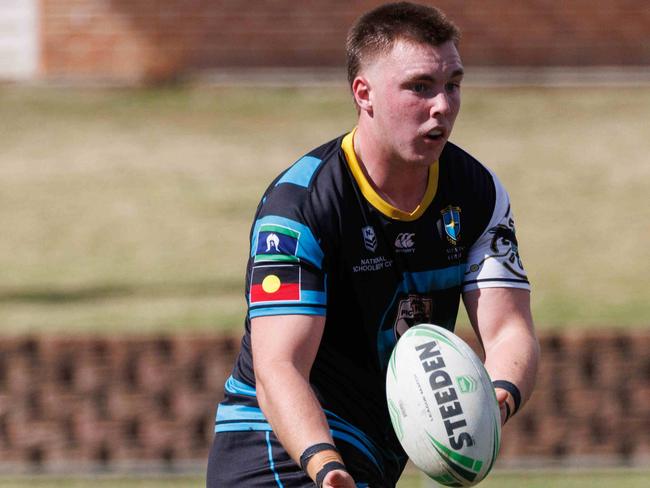 DAILY TELEGRAPH AUGUST 16, 2023Westfield Sports High (Navy/yellow) versus All SaintÃs College Maitland (blue/black) in the NRL School Boys Competition at Windsor today. Pictured is Jack Hilliar (Maitland) with the ball. Picture: David Swift.