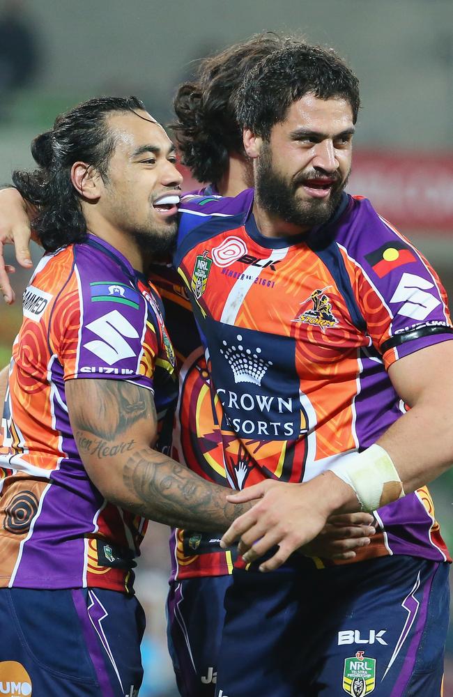 Mahe Fonua is congratulated after scoring a try.