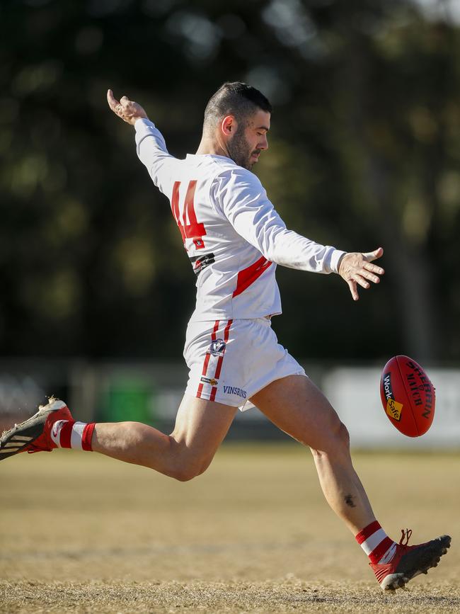 Josh Iezzi takes a kick for Sorrento. Picture: Valeriu Campan