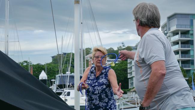 Townsville couple Corinne and Shane Baildon prepare their yacht for Tropical Cyclone Kirrily at Townsville's Breakwater Marina on Thursday morning. Picture: Blair Jackson