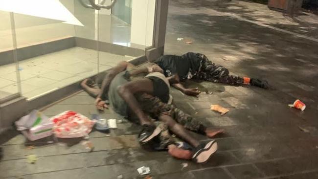 Drunken itinerants lie passed out in the middle of the Cairns CBD. Picture: Supplied