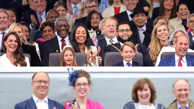 Catherine, Duchess of Cambridge, Princess Charlotte of Cambridge, Prince George of Cambridge, Prince William, Duke of Cambridge watch Paddington Bear and HM The Queen on screen during the Platinum Party. Picture: Chris Jackson/Getty Images.