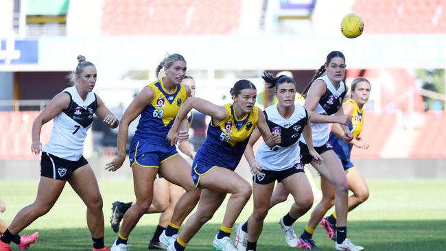 Bond University Aussie rules player Mia Salisbury leads the park to the ball. Picture: Supplied by Bond University.