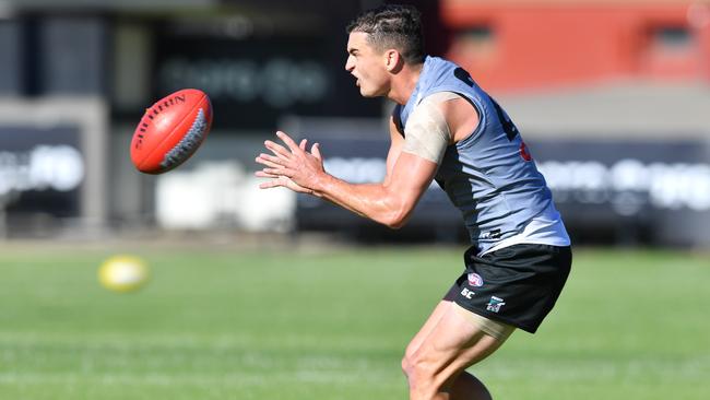 Tom Rockliff fired with several senior teammates on the sidelines for the showdown. Picture: AAP Image/David Mariuz.