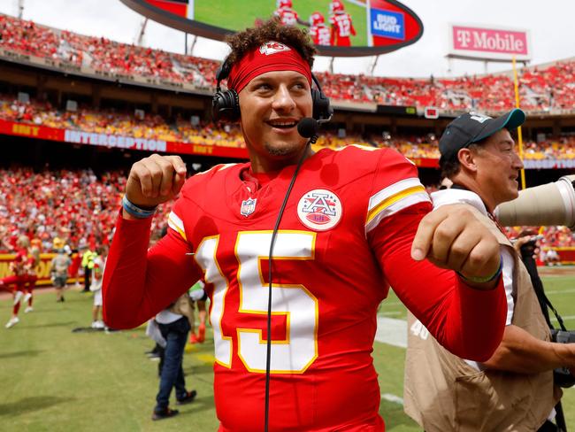 KANSAS CITY, MISSOURI - AUGUST 26: Patrick Mahomes #15 of the Kansas City Chiefs smiles during an on-field television interview during the third quarter of a preseason game against the Cleveland Browns at GEHA Field at Arrowhead Stadium on August 26, 2023 in Kansas City, Missouri.   David Eulitt/Getty Images/AFP (Photo by David Eulitt / GETTY IMAGES NORTH AMERICA / Getty Images via AFP)