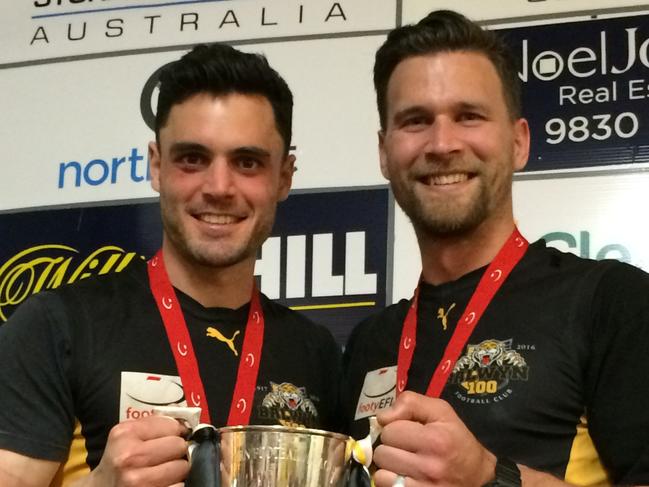 John Milhuisen (left) celebrates the 2016 premiership with Rod Crowe.