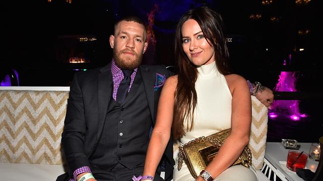 Mixed martial artist Conor McGregor (L) and Dee Devlin attend his birthday celebration at Intrigue Nightclub at Wynn Las Vegas early July 10, 2016 in Las Vegas, Nevada. (Photo by David Becker/Getty Images for Wynn Las Vegas)