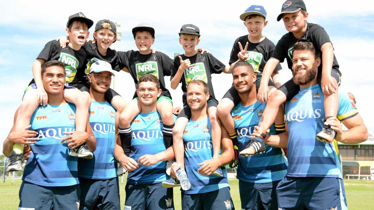 Titans' players and juniors take time out for a bit of fun at the Titans' NRL School Holiday Footy Clinic at Cudgen Fields on Tuesday, April 19. Picture: Daniel McKenzie