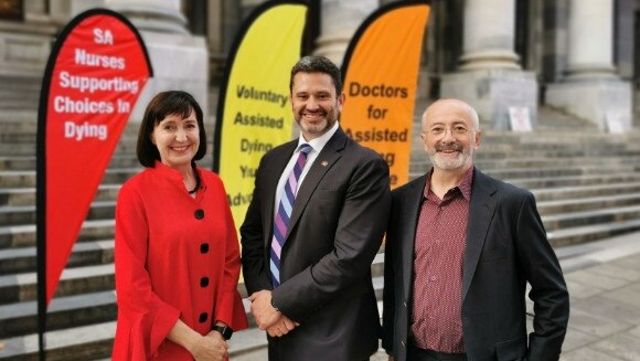 Labor MP Susan Close, Labor MLC Kyam Maher and Go Gentle founder and well known broadcaster Andrew Denton at Parliament House before the VAD candlelight vigil.