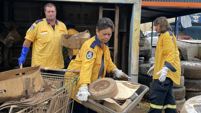 NSW Rural Fire Service continue major cleanup in South Lismore at North Coast Wholesale Cars.