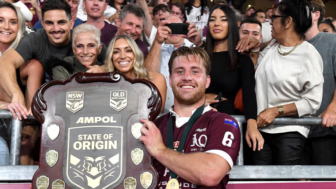 Munster celebrates with fans after Queensland’s victory.