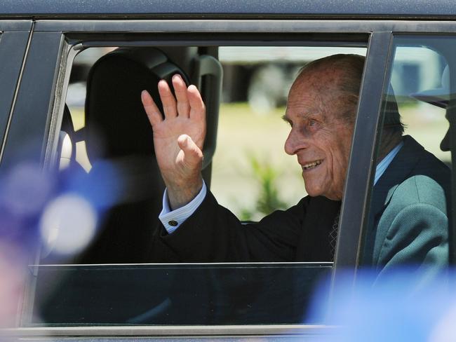 Prince Phillip, Duke of Edinburgh waves as he leaves the Great Aussie Barbecue in Perth - the couple’s final public engagement in Australia on October 29, 2011. AFP PHOTO / Greg WOOD / AFP PHOTO / GREG WOOD