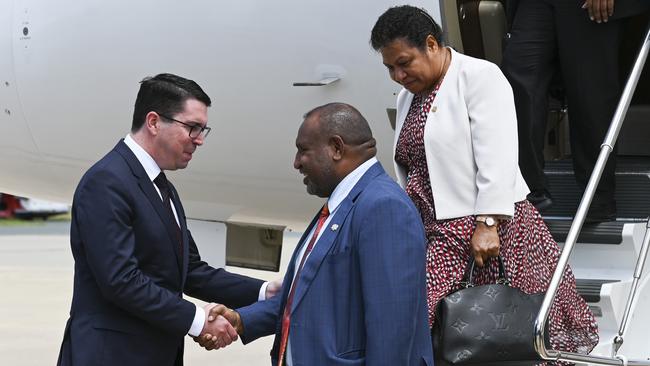 PNG Prime Minister James Marape and his wife, Madam Rachael Marape, are welcomed to Canberra by Assistant Minister to the Prime Minister, Patrick Gorman. Picture: NCA NewsWire / Martin Ollman