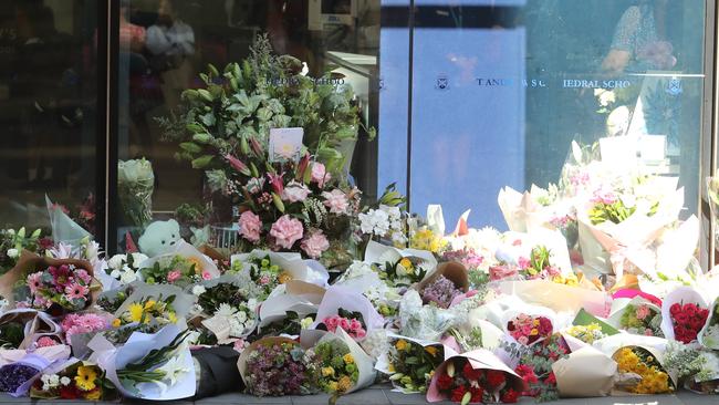 Flowers left outside St Andrew's Cathedral School for teacher Lilie James, who was murdered by Paul Thijssen. Picture: Rohan Kelly