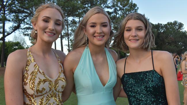 Mackenzie Smyth, Lara Feenaghty and Courtney Calvert at the Pioneer State High School formal at the Mackay Golf Course on Friday November 20. Picture: Zizi Averill