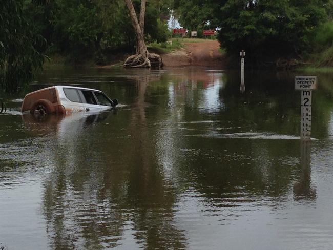 This driver’s vehicle was swept off the causeway in December 2014. PICTURE: Supplied