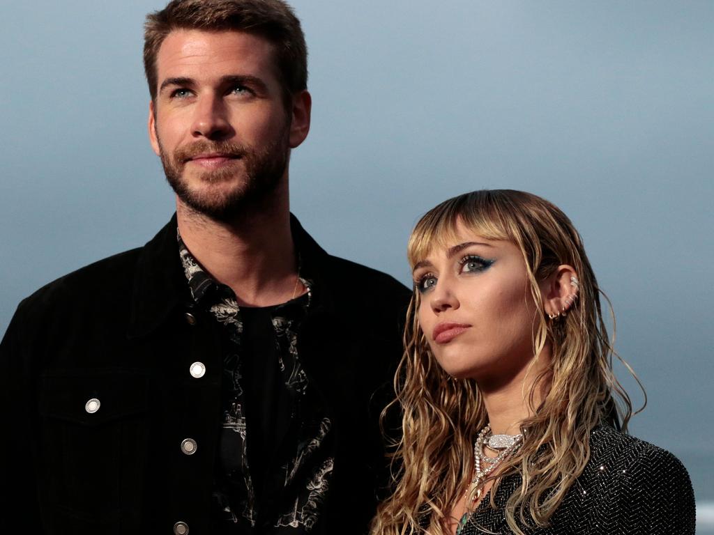 Miley Cyrus and Liam Hemsworth pictured last month in Malibu. Picture: AFP