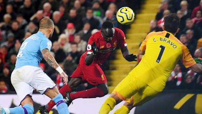 Sadio Mane nods home Liverpool’s third goal.