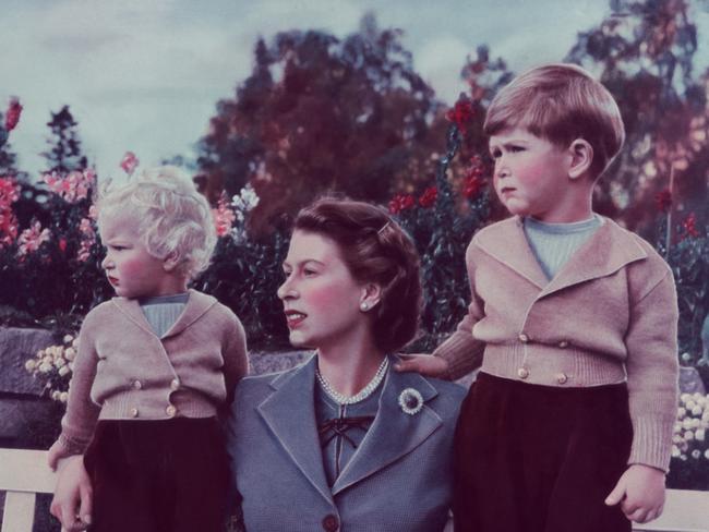 Queen Elizabeth II with her children Charles and Anne at Balmoral, 1952. Picture: Corbis via Getty Images