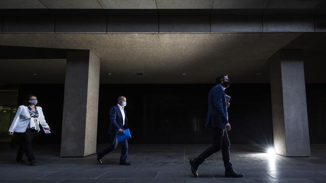 The Premier, Ms Mikakos and Education Minister James Merlino after a media briefing in early September. Just weeks later Ms Mikakos would quit. Picture: Getty