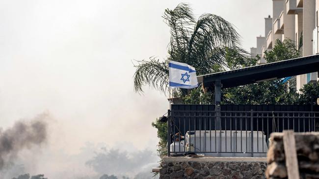 Fire surrounds apartments after rockets launched from southern Lebanon landed near Katzrin in the Israel-annexed Golan Heights. Picture: AFP.