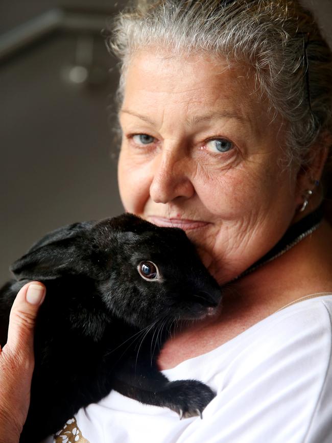 Donna Luck with her rabbit at the evacuation centre in Laurieton. Nathan Edwards