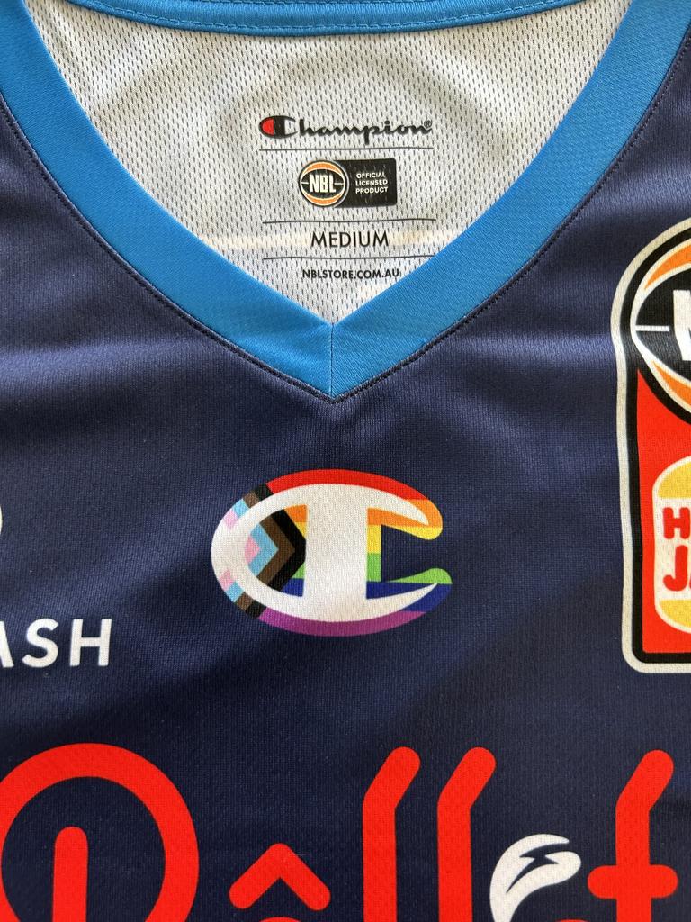 Melbourne United jersey for Pride Round sporting Champion pride logo.